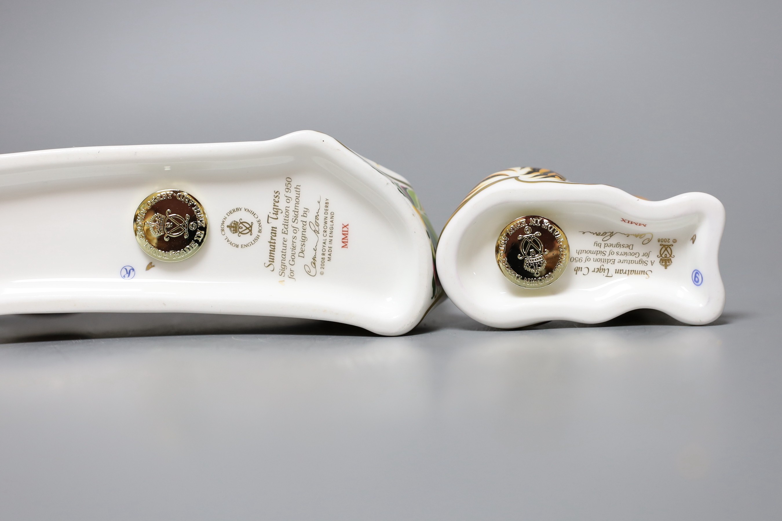 Two Royal Crown Derby paperweights - Sumatran Tigress, gold stopper, boxed with certificate and Sumatran Tiger Cub, gold stopper, boxed with certificate